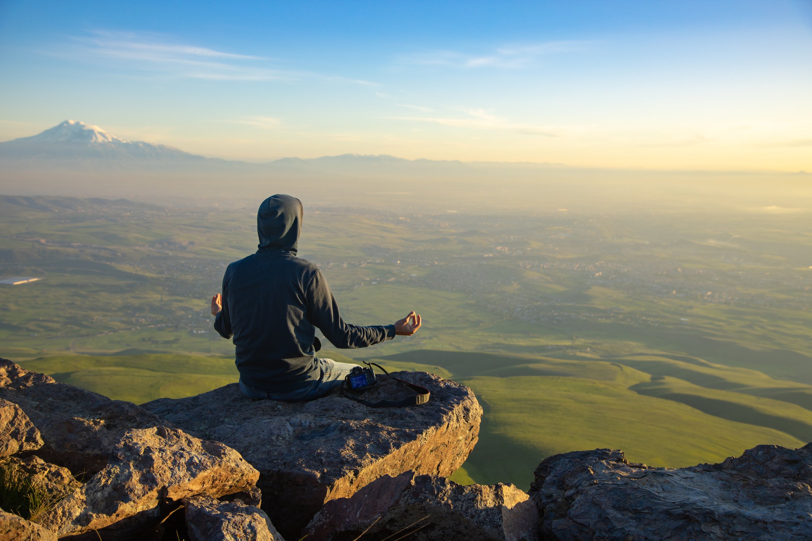 meditating man  in the mountain